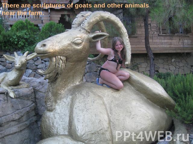 There are sculptures of goats and other animals near the farm.