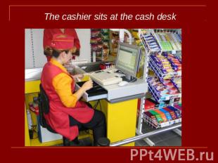 The cashier sits at the cash desk