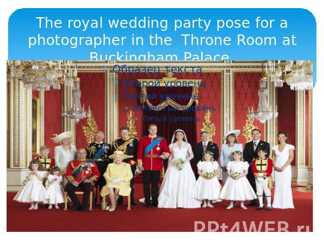 The royal wedding party pose for a photographer in the Throne Room at Buckingham Palace.