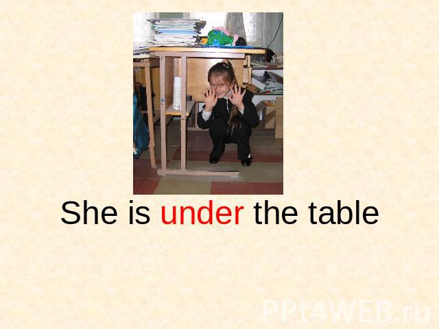 She is under the table